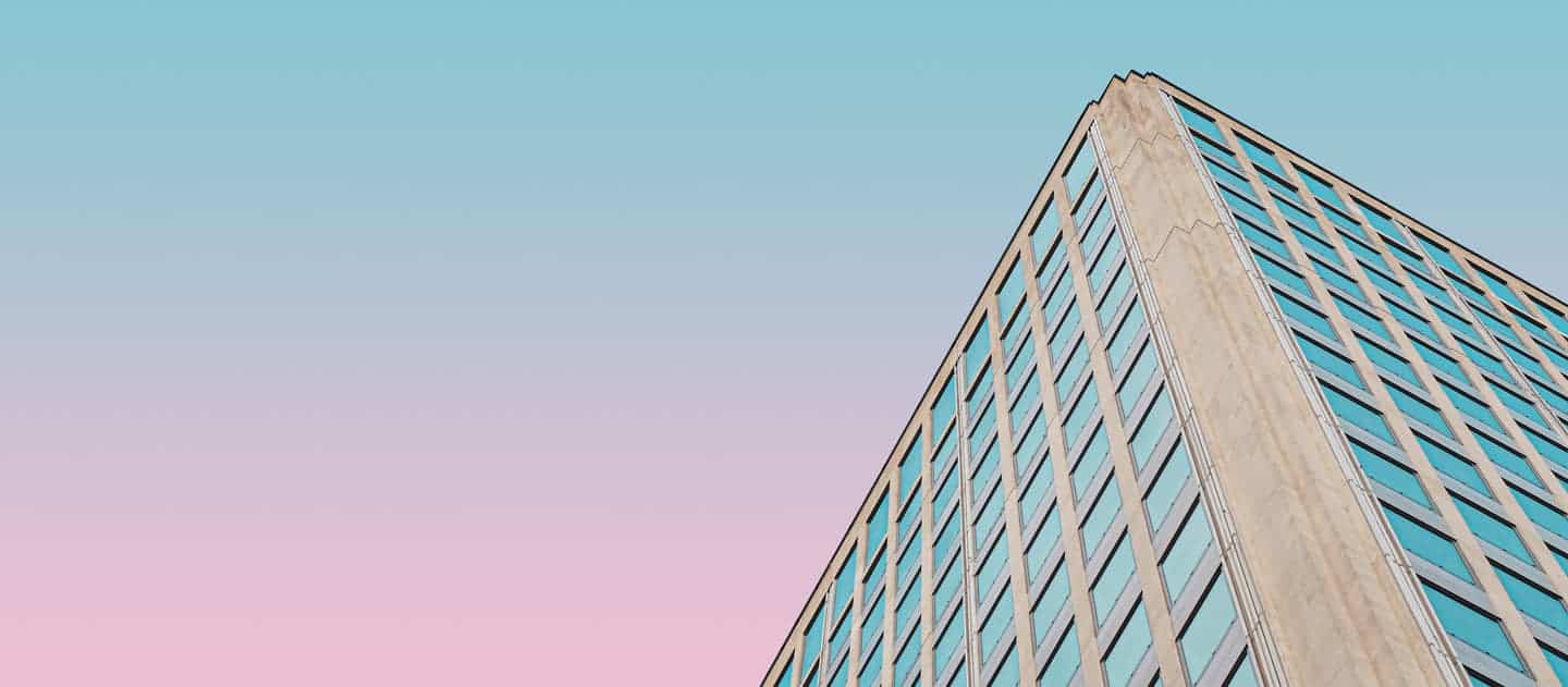 Image of a large city skyscraper at dusk