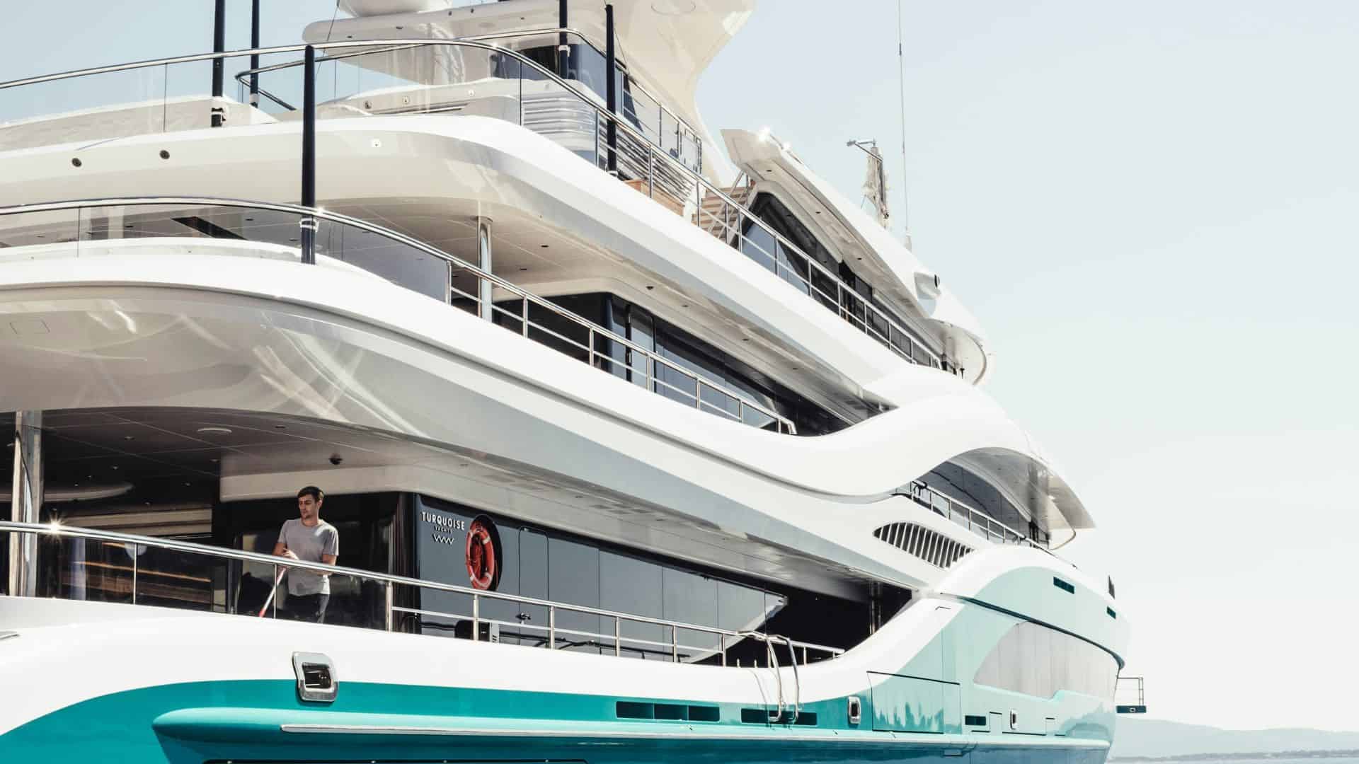 Man standing on board a superyacht