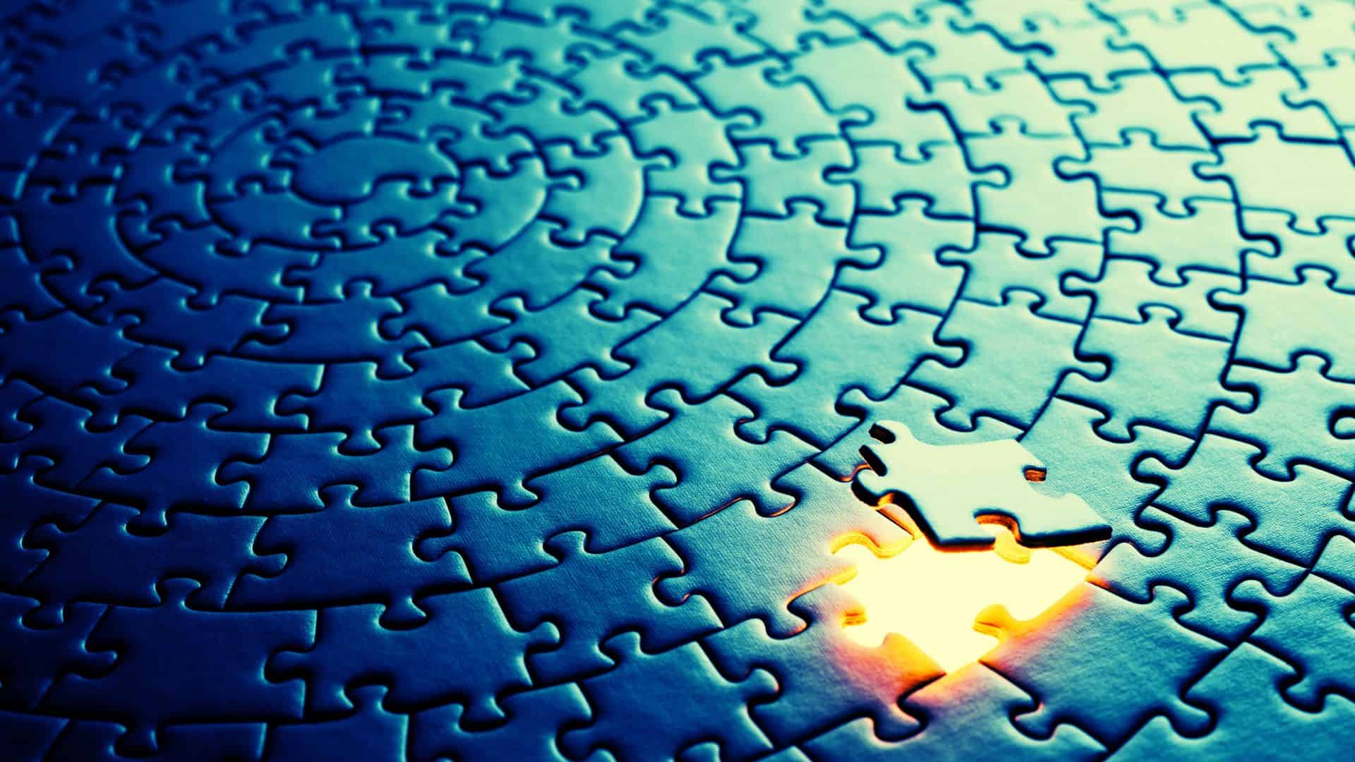 A vast puzzle with one piece missing.